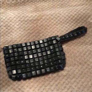 Clutch. New without tags. Computer keys.